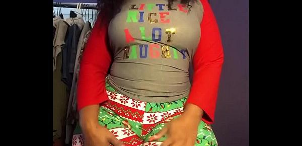  Cherokee D Ass stretching in Christmas leggings